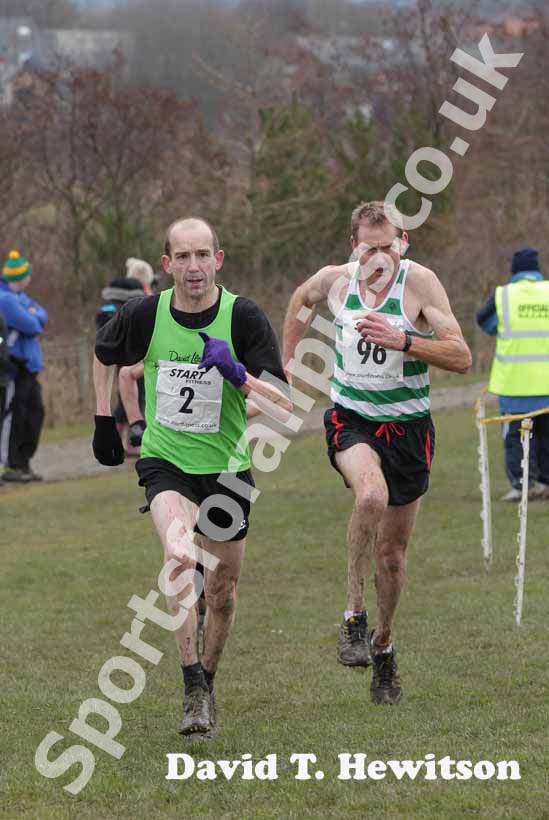 Battle to finish between No 2 Keith Miller (David Loyd Redway Runners) 45-49 and Michael Hager (Tipton) 60-64 winner, males 35 to 64race, BMAF Cross Country, Herrington, Sunderland.